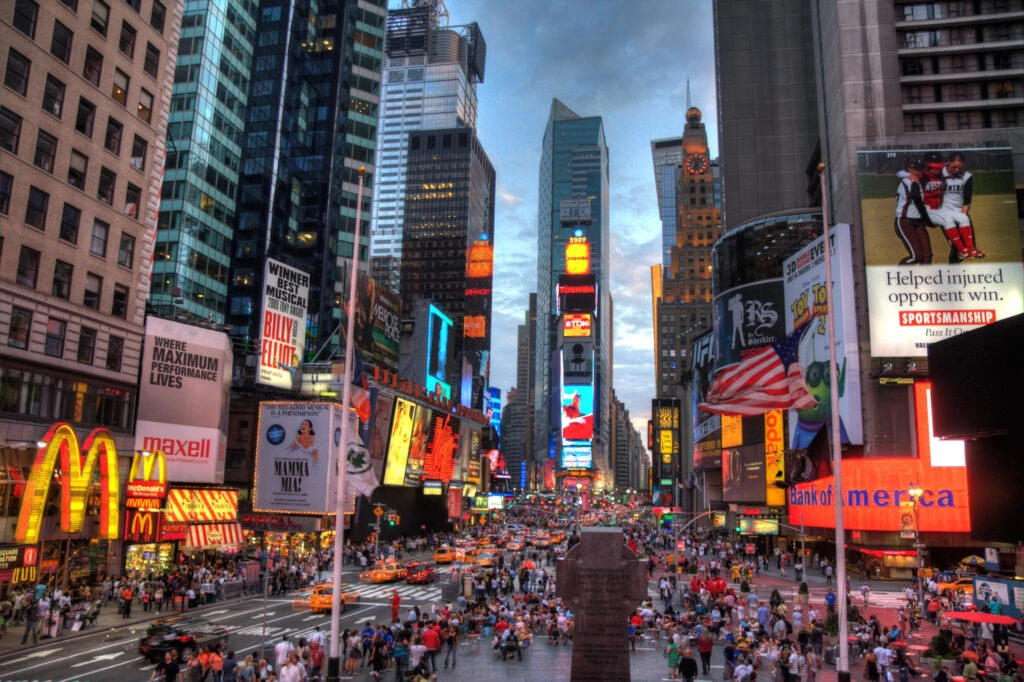 USA location image – Times Square in New York City with bright signage and crowds